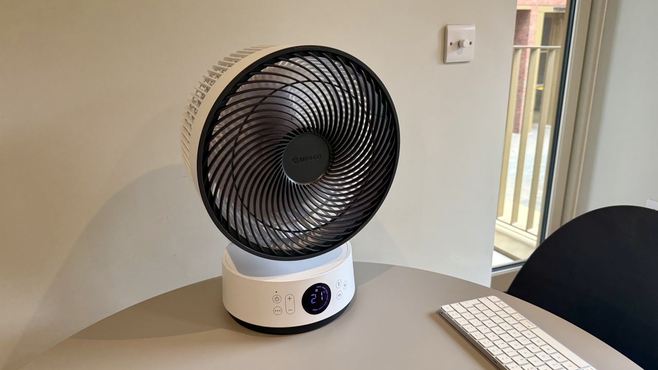 The MeacoFan Sefte Pro 10" Table Air Circulator picturd on a grey table
