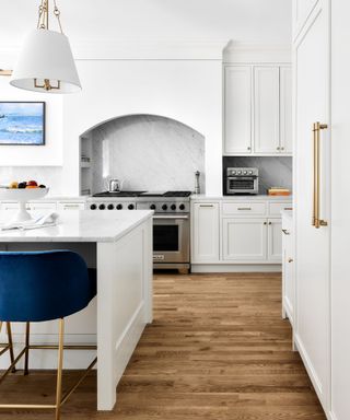 a kitchen painted in an off-white hue