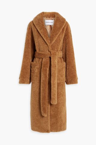 Tinley belted faux fur coat on a plain backdrop