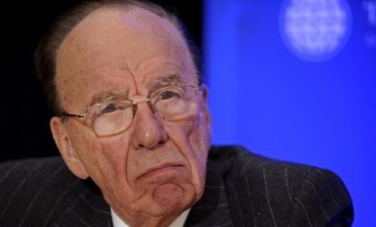 Rupert Murdoch's News of the World tabloid is accusing The Times of breaching its ethics guidelines by publishing a rumor aimed at punishing the Wall Street Journal.