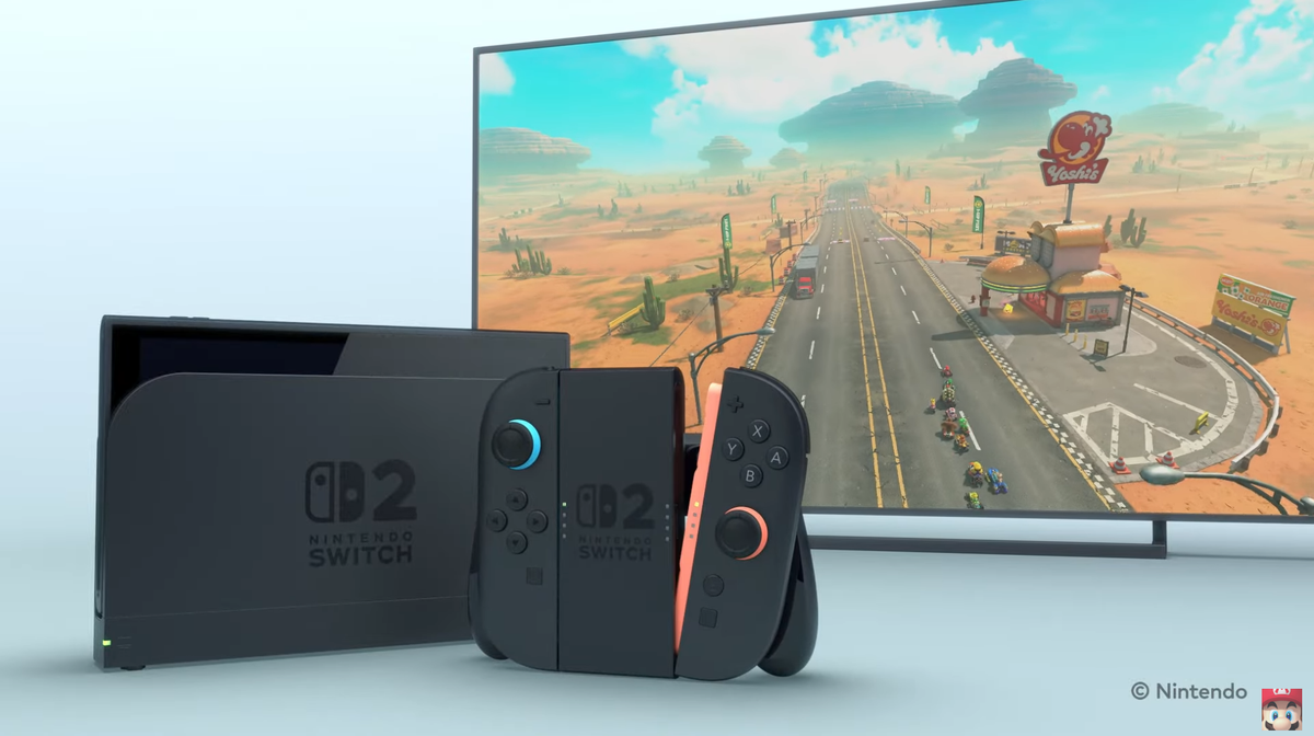 The Nintendo Switch 2 as shown in its announcement trailer with orange and blue accents and removeable controllers.