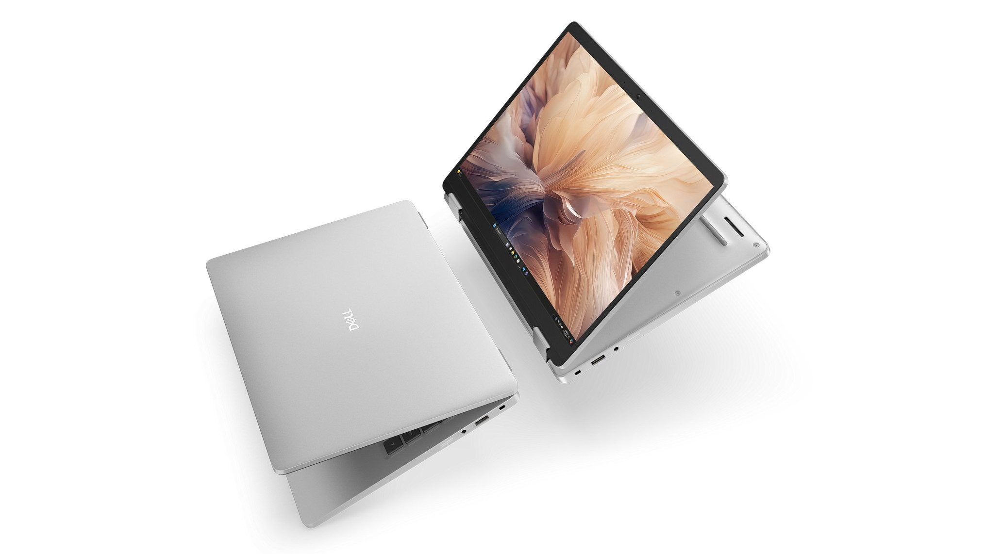 Two Dell laptops next to each other, one closed, one open showing the display