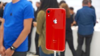 An iPhone XR in red