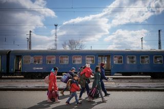 Refugees fleeing Ukraine arrive at the border train station of Zahony on March 10, 2022 in Zahony, Hungary. More than 2 million refugees have fled Ukraine since the start of Russia's military offensive, according to the UN. Hungary, one of Ukraine's neighbouring countries, has welcomed more than 144,000 refugees fleeing Ukraine after Russia began a large-scale attack on Ukraine on February 24.