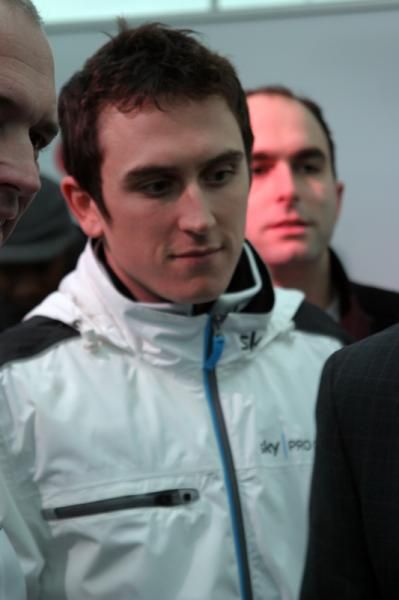 Geraint Thomas watches on as Brad Wiggins has his turn