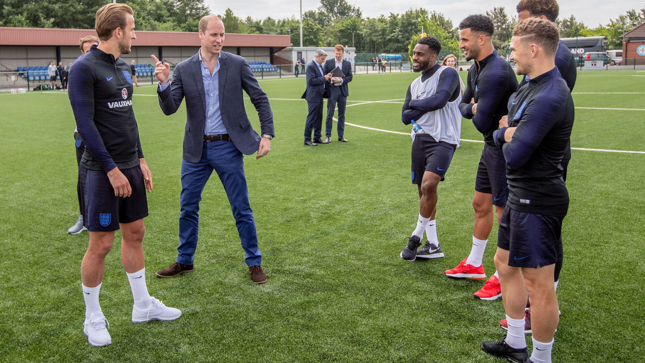 Britain&#039;s Prince William, Duke of Cambridge (C), President of the Football Association speaks with England football players