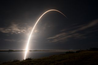 A long-exposure photo of a SpaceX Falcon 9 rocket launching 53 Starlink satellites from NASA’s Kennedy Space Center in Florida on Feb. 2, 2023. 