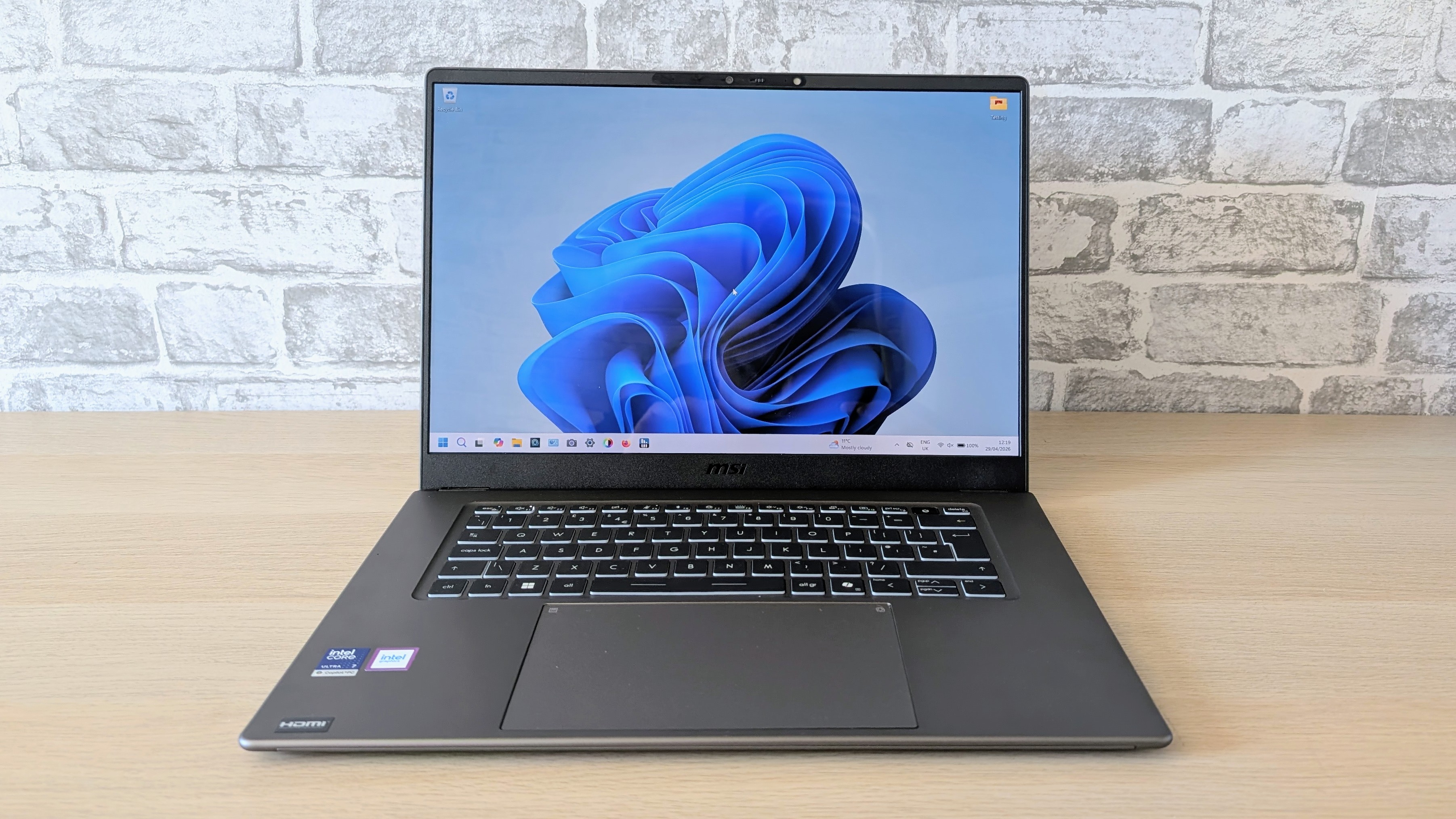 The MSI Prestige A16 AI+ on the ITPro background
