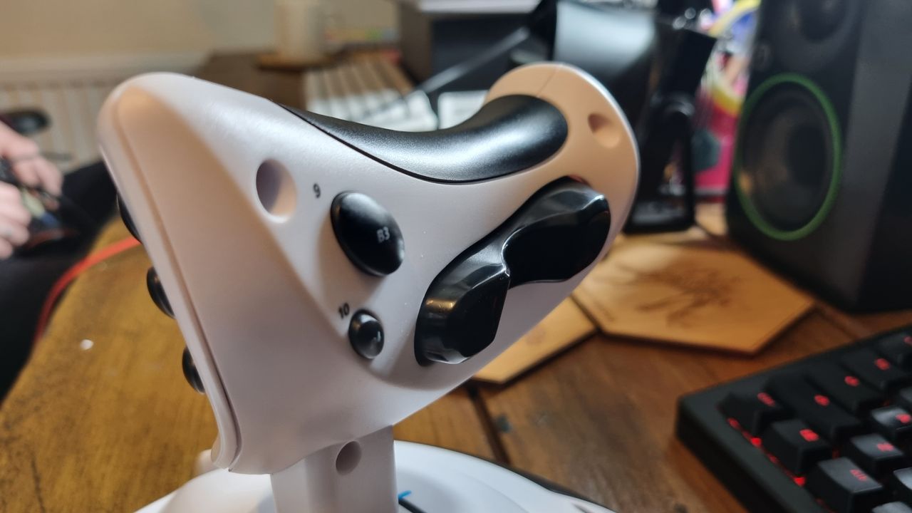 The controls of the Thrustmaster T.Flight HOTAS One Microsoft Flight Simulator Edition on a wooden desk