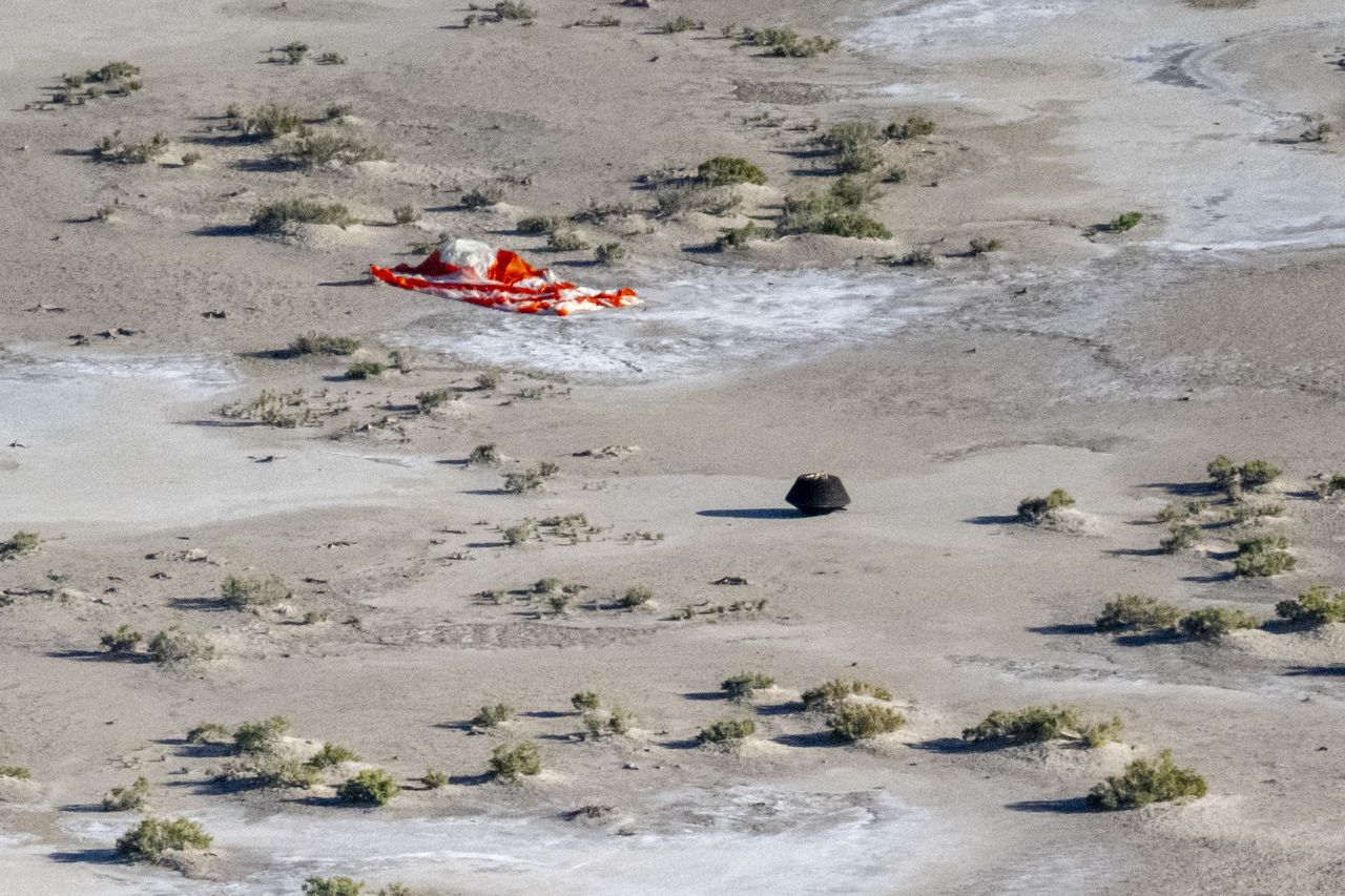 The sample return capsule from NASA&rsquo;s OSIRIS-REx mission is seen shortly after touching down in the desert, Sunday, Sept. 24, 2023, at the Department of Defense's Utah Test and Training Range.