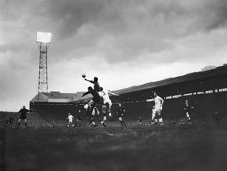 AC Milan and Manchester United in action in the European Cup semi-finals at Old Trafford in May 1958.