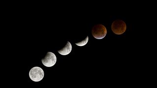 A time lapse of a total lunar eclipse showing the moon at various phases of an eclipse.