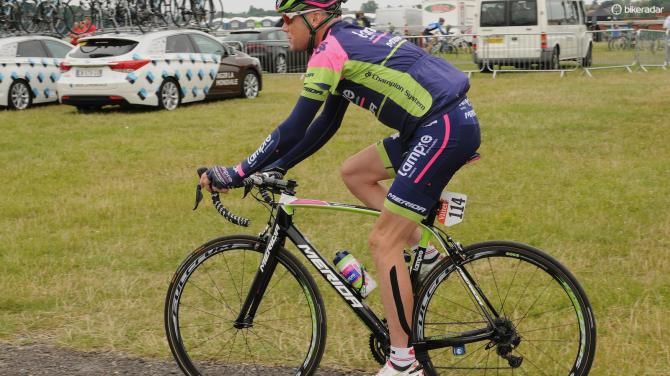 Chris Horner is taped up at the start of stage 2