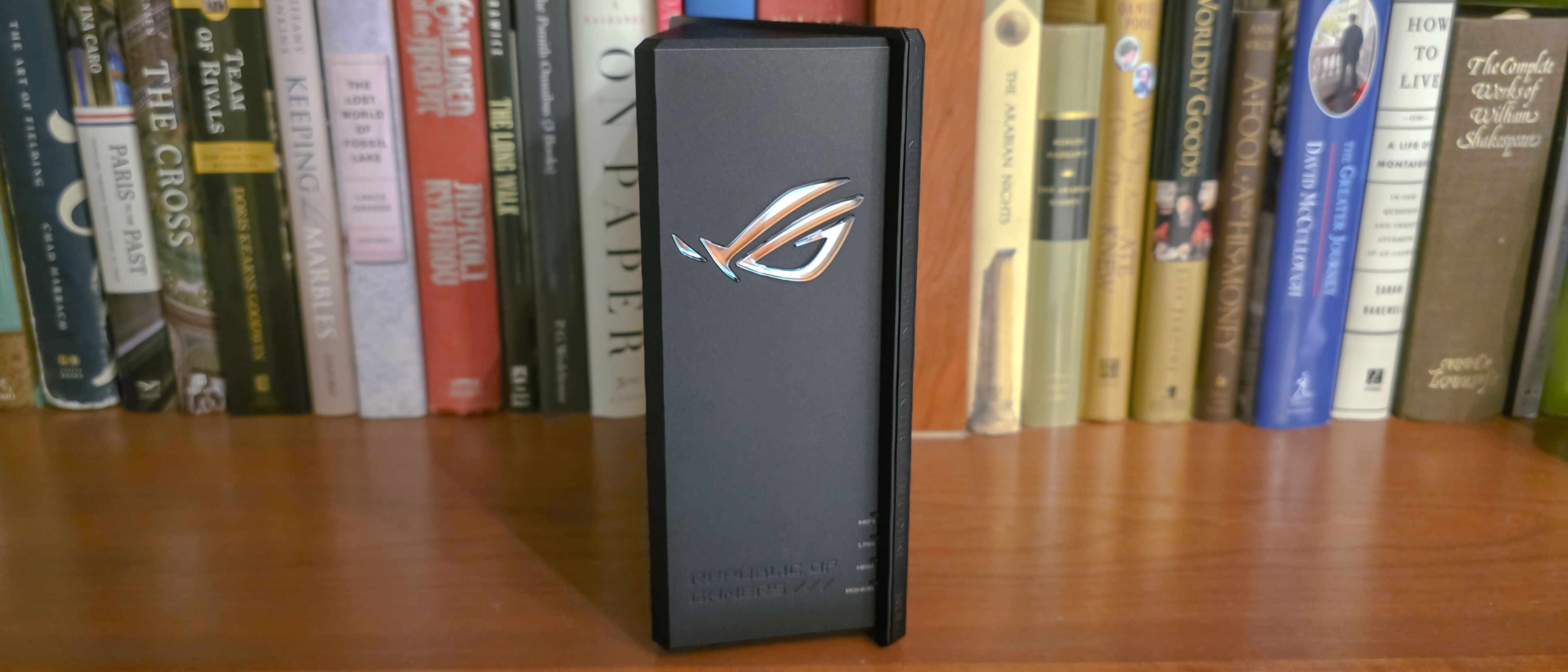 Asus ROG Strix GS-BE18000 gaming router on a table