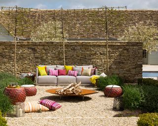 screening wall from pool with espaliered trees