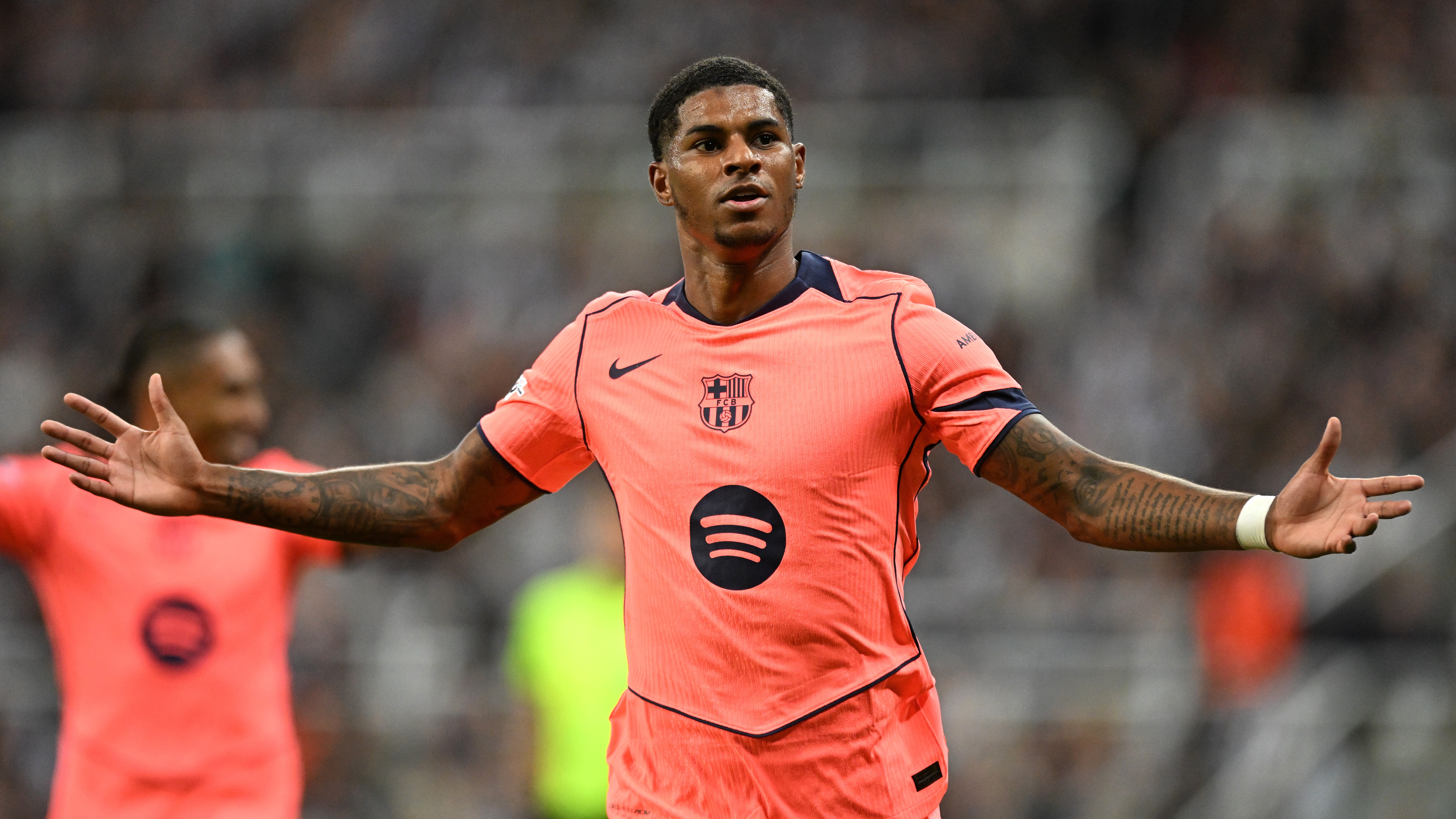 Marcus Rashford celebrates scoring his team's second goal during the UEFA Champions League 2025/26 League Phase MD1 match between Newcastle United FC and FC Barcelona at St James' Park on September 18, 2025 in Newcastle upon Tyne, England. 