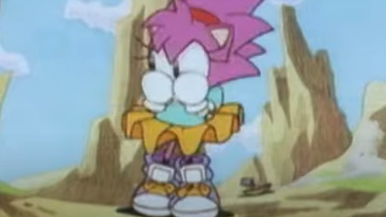 Amy asomándose por detrás de sus guantes en Sonic CD