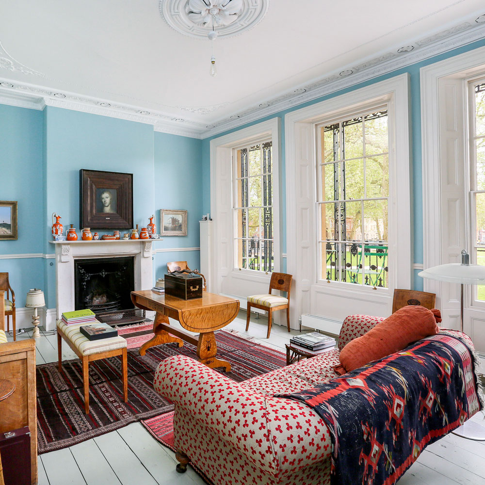 living room with wooden flooring and sofa
