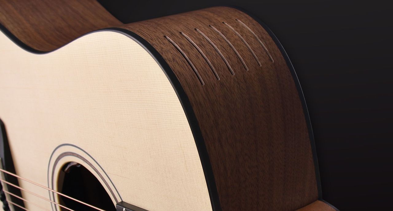 Furch Guitars Booster Soundport: a new design that enhances volume and tone, featuring six precision cuts on the top of the body to complement the soundhole