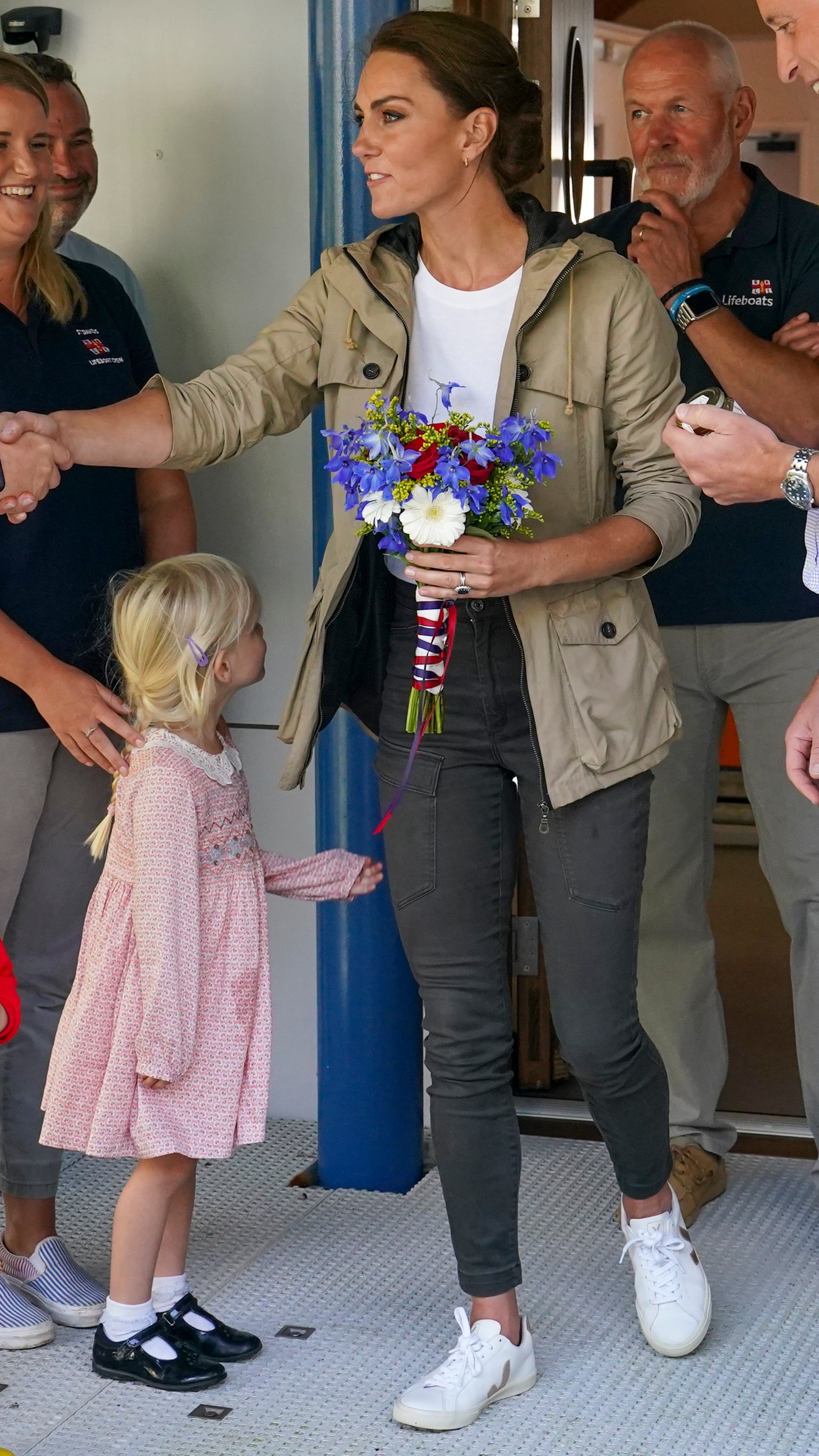 Catherine, Princess of Wales shakes someone&#039;s hand as she visits the RNLI LifeBoat Station at St Davids in 2023