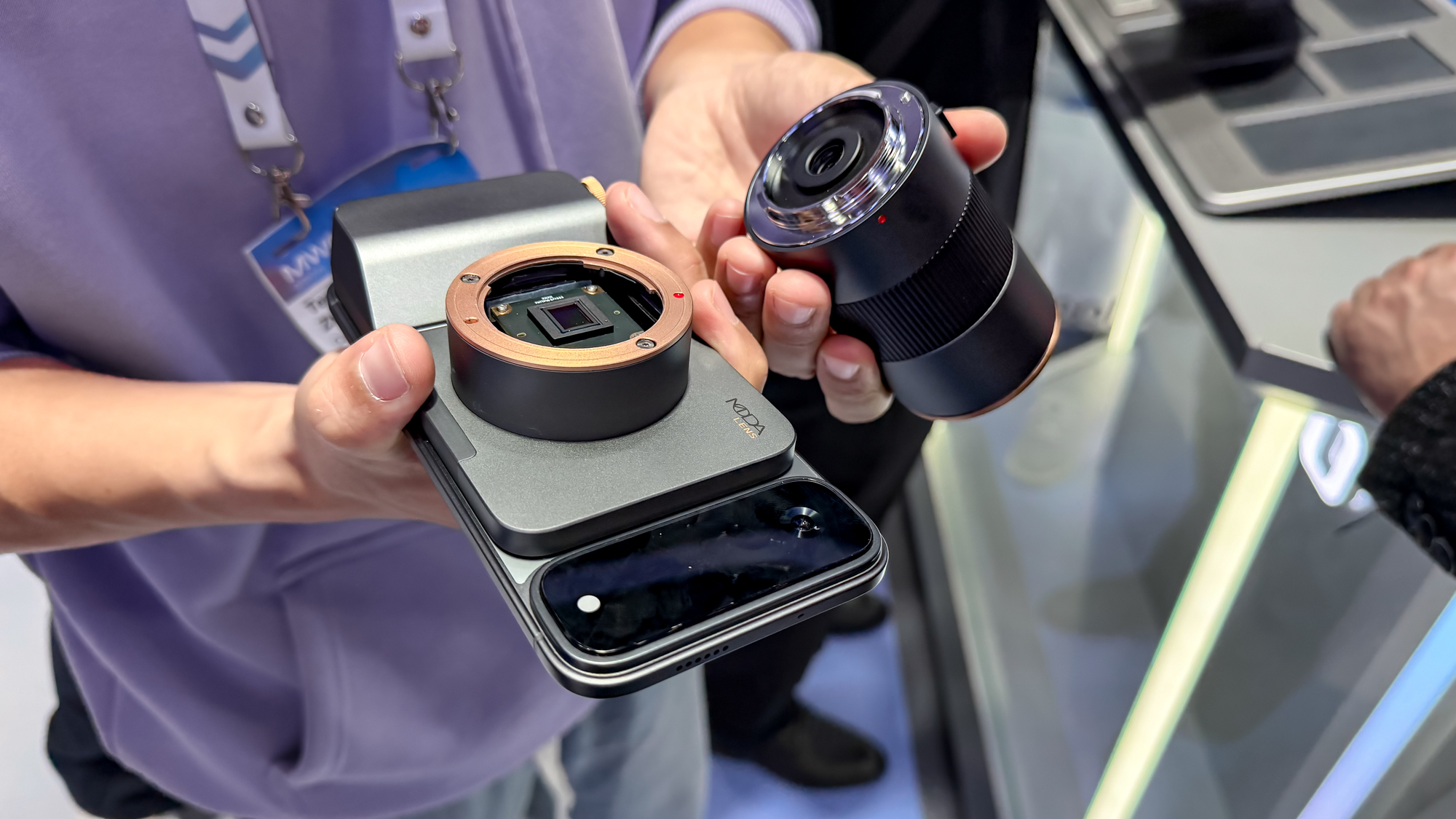 Tecno modular phone camera add-on with lens removed and additional sensor exposed