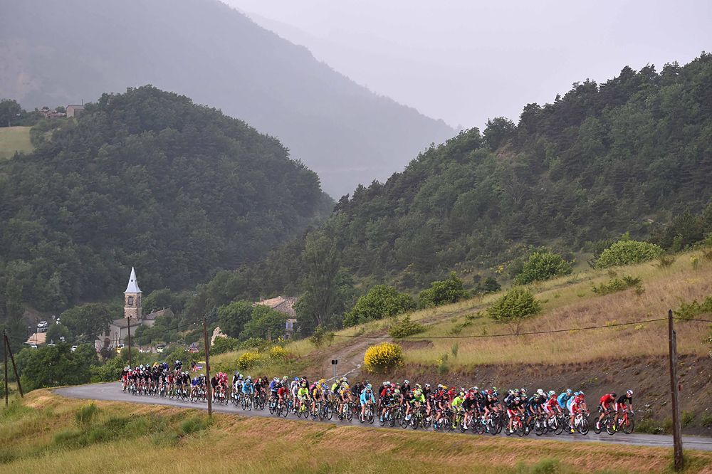 The peloton races during stage 4 at the Criterium du Dauphine
