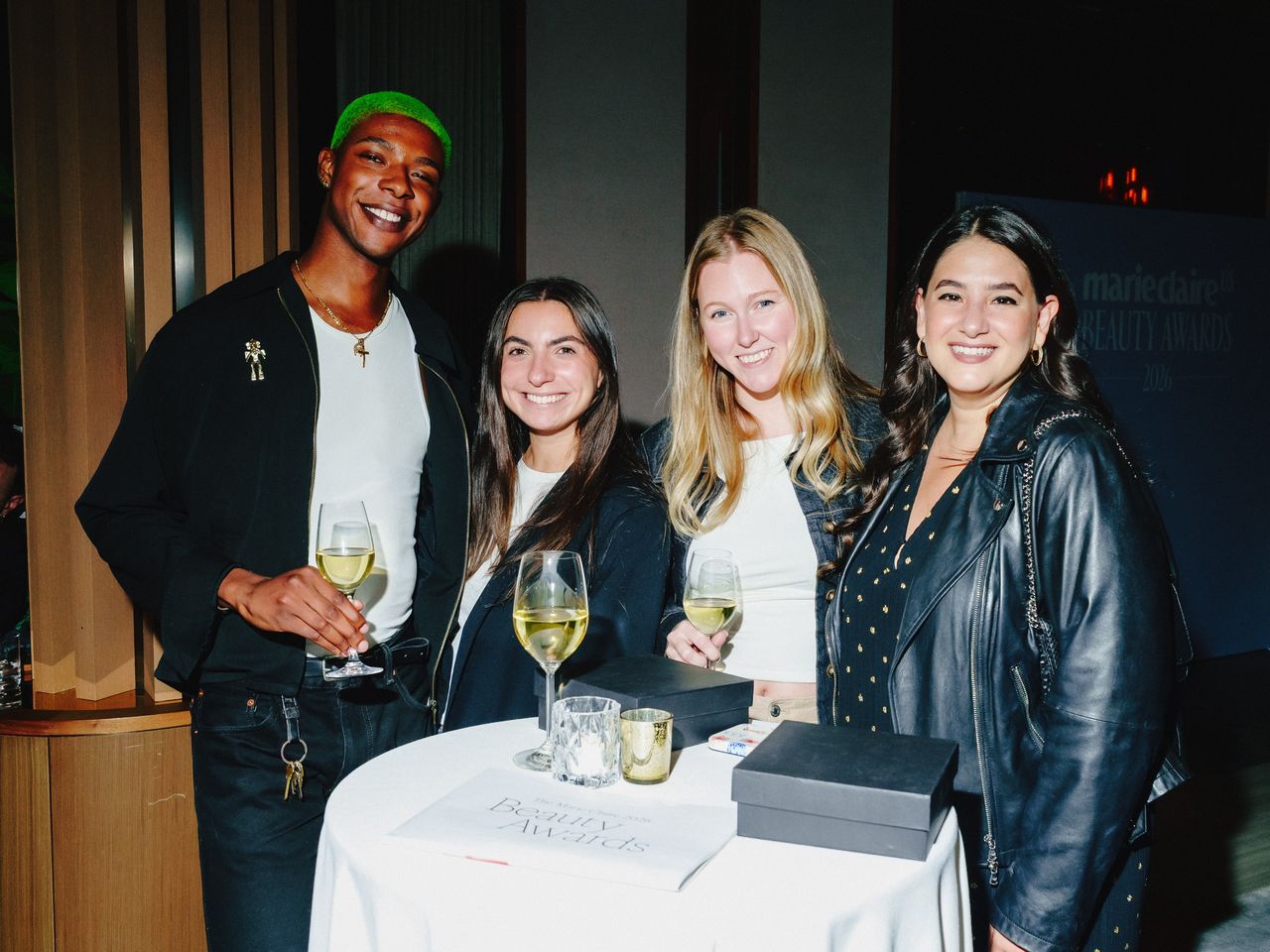 four people at a party in NYC