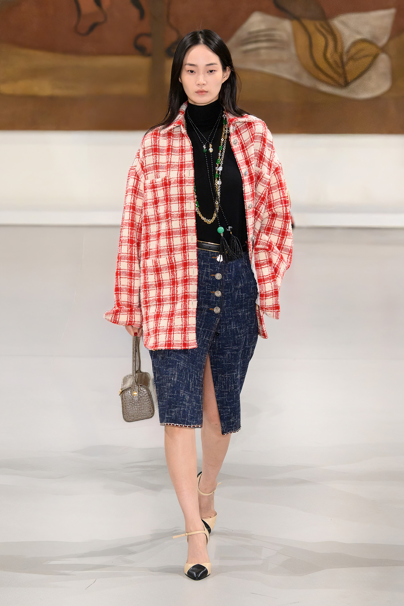 A model wore a flannel shirt during Chanel's M&amp;eacute;tiers d'Art Spring 2026 show