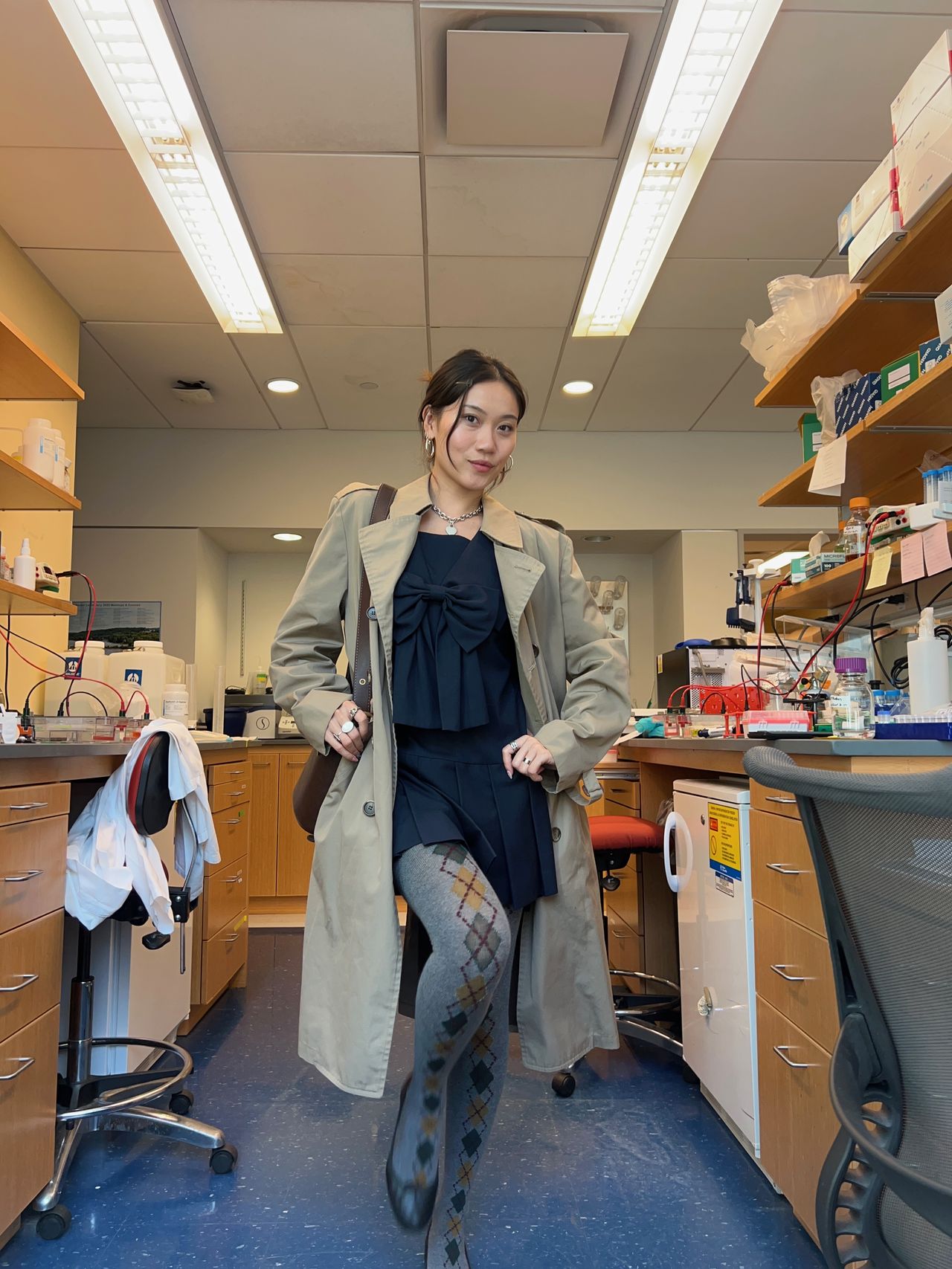 Vivian Li in the science lab wearing day to night outfits