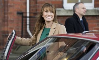 Harry Wild season 3: Jane Seymour as Harry, posing next to a car and smiling