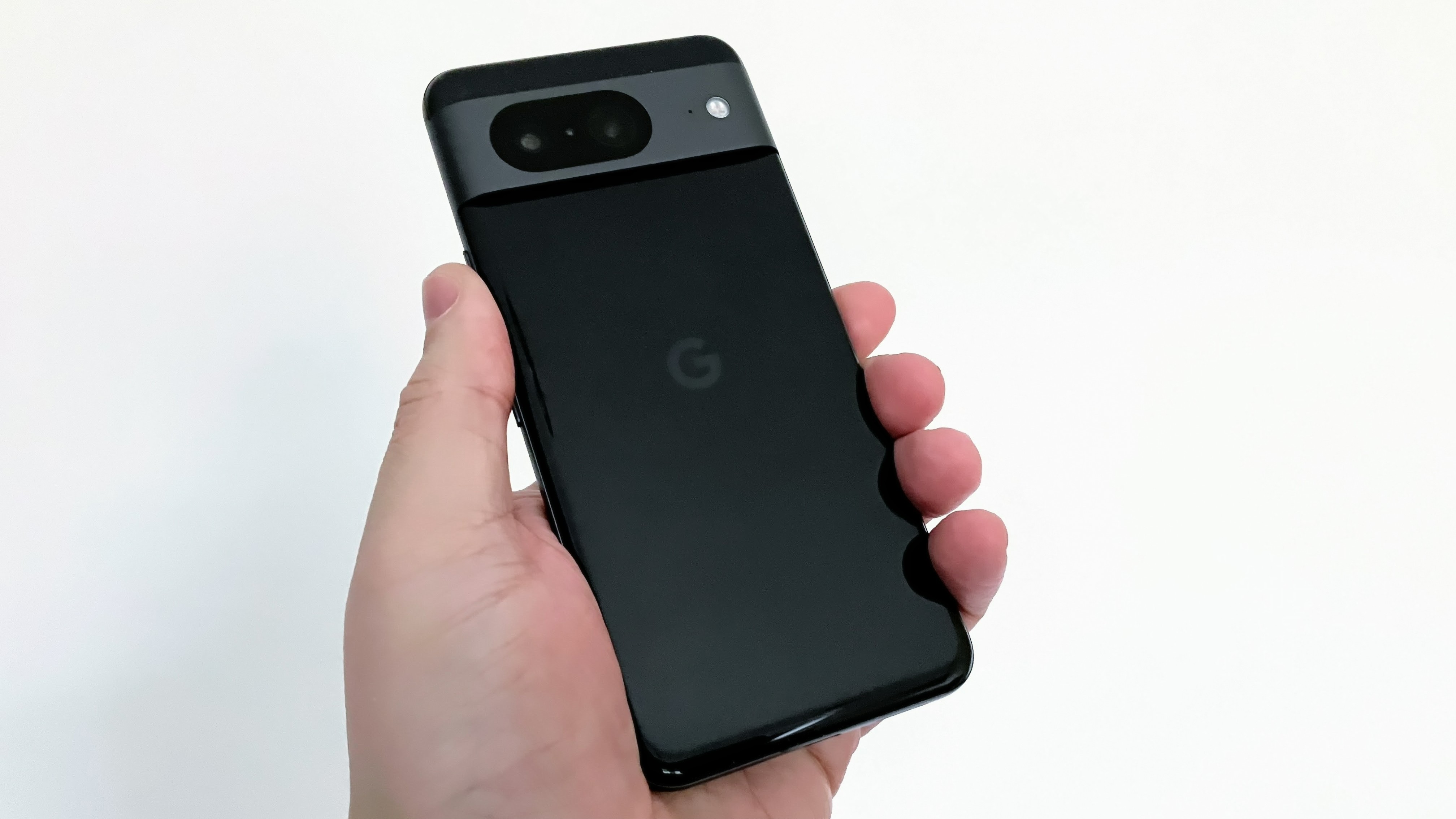 The rear of the Obsidian colored Google Pixel 8