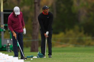 Tiger and Charlie Woods on the range