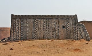 The Cour Royale buildings made from mud