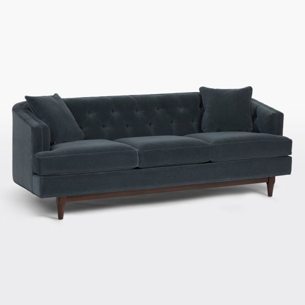 blue gray sofa with wooden legs