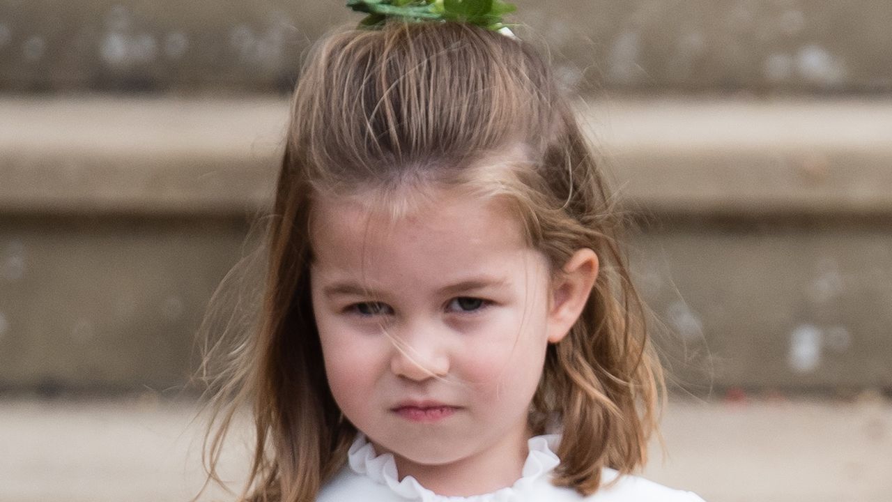 Princess Charlotte of Cambridge attends the wedding of Princess Eugenie of York and Jack Brooksbank at St George&#039;s Chapel in Windsor Castle on October 12, 2018 in Windsor, England