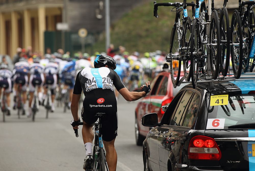 Mathew Hayman of Australia and SKY Procycling drops back to his team car during the 2012 Milan San Remo