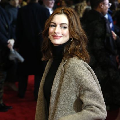 Hair, Red carpet, Premiere, Carpet, Fashion, Hairstyle, Outerwear, Event, Long hair, Flooring, 