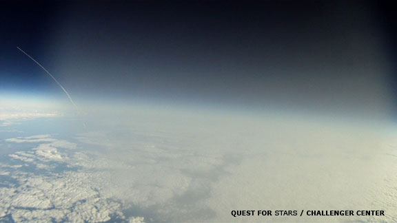 This frame grab from a video -- shot by a GoPro Hero Motorsport camera aboard the Robonaut-1 balloon -- shows the shuttle Discovery streaking toward space on its final mission. The shot was taken at 5:05 EST on Feb. 24, 2011 as the balloon was traveling t