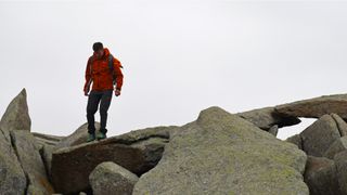 Man wearing Salewa Puez Gore-Tex Paclite Jacket while climbing Tryfan in Snowdonia