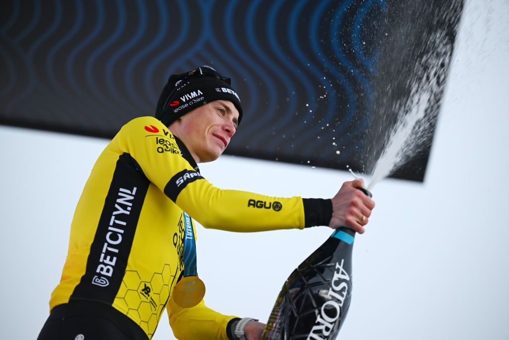 Jonas Vingegaard (Visma-Lease A Bike) celebrates at podium as stage winner and race leader