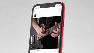 Man playing electric guitar on Instagram