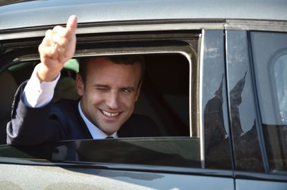 French President Emmanuel Macron in his car