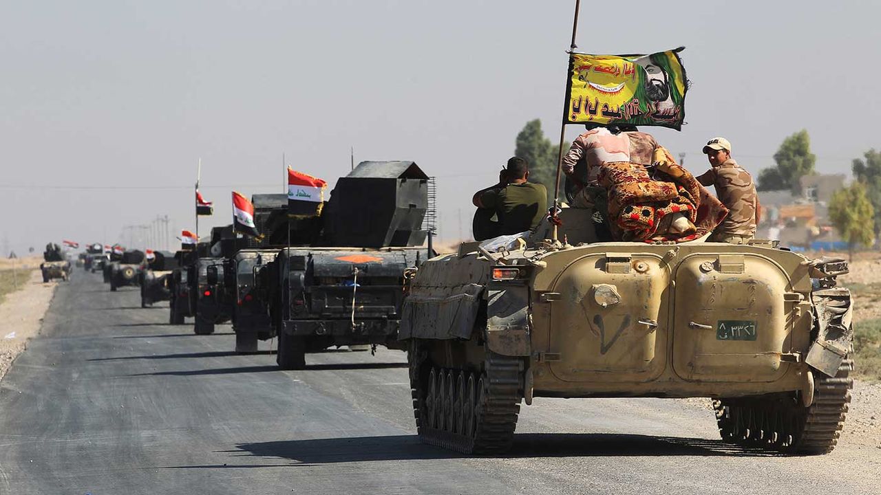 Iraqi forces drive into the centre of the disputed city of Kirkuk