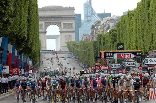 The Tour de France peloton races on the streets of Paris..