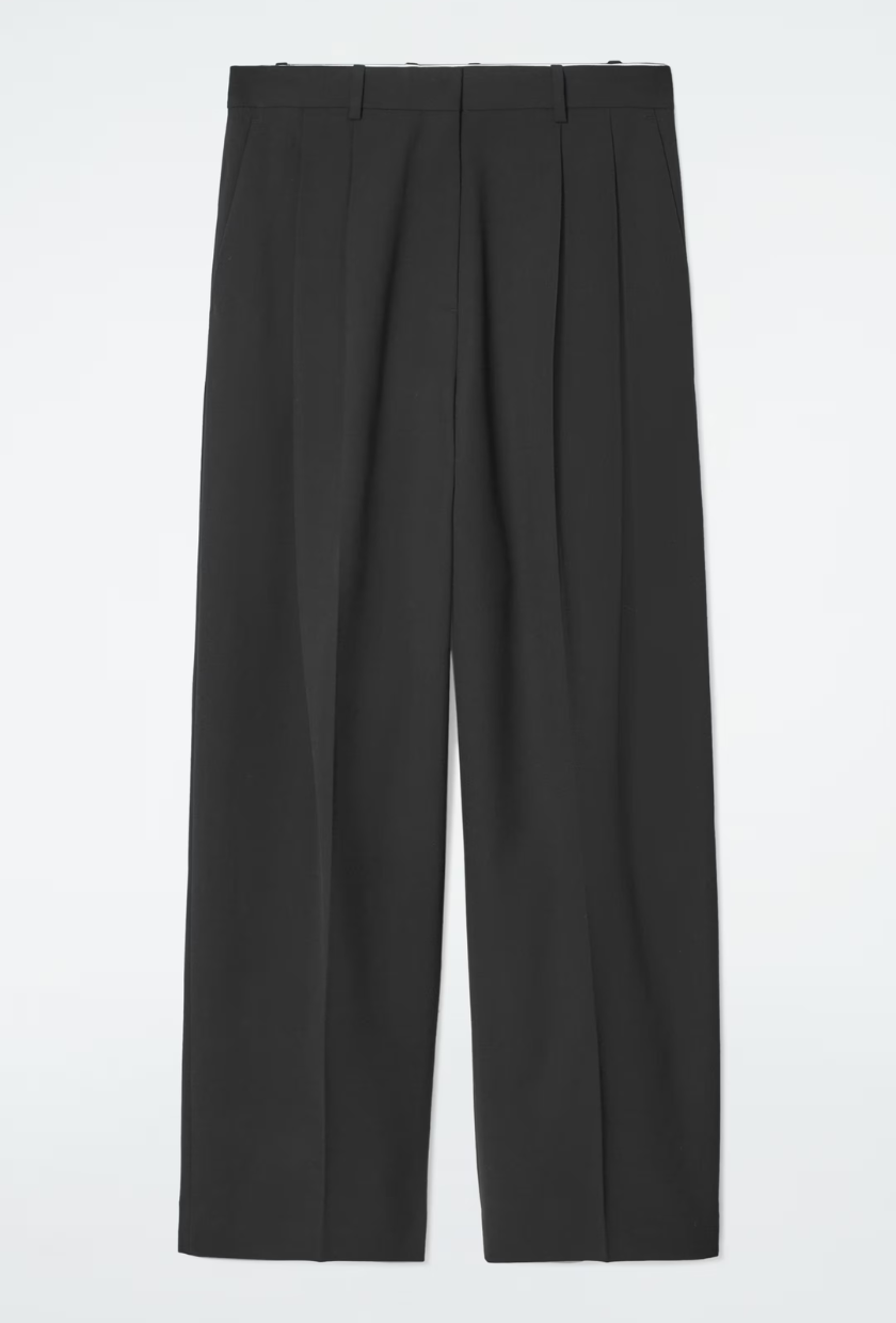An image of COS trousers, a staple of preppy fashion. 