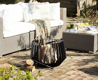 Cattrall Steel Charcoal Fire Pit from Wayfair