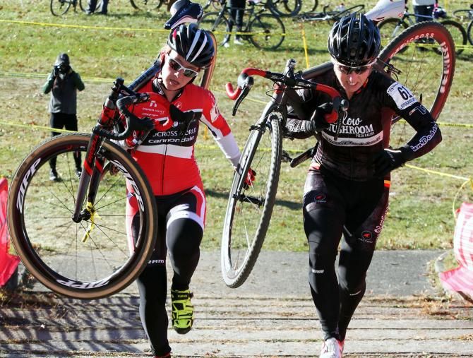Youngster Emma White (Cyclocrossworld) goes step to step with seasoned veteran Laura Van Gilder (Van Dessel p/b Mellow Mushroom) while battling it out for second place.