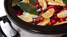 Cranberry Sauce simmering in a Crock Pot - stock photo