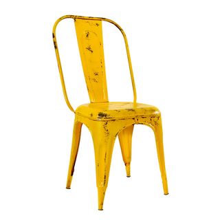 yellow metal chair