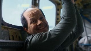 Mark Wahlberg smiles as he's being held in captivity in Flight Risk.